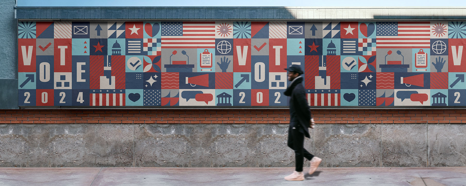 A person in a black outfit and pink shoes walks past a mural featuring red, white, and blue geometric designs and symbols related to voting and democracy. The mural, a brilliant piece of political advertising, displays the words "VOTE" and "2024" prominently throughout the artwork.