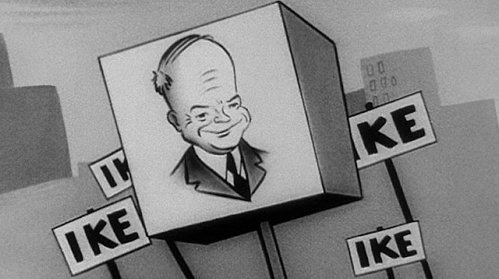 A black and white cartoon illustration of a smiling man in a suit and tie is depicted on a cube. Surrounding the cube are several signs with the word "IKE" on them, reminiscent of political advertising strategies.